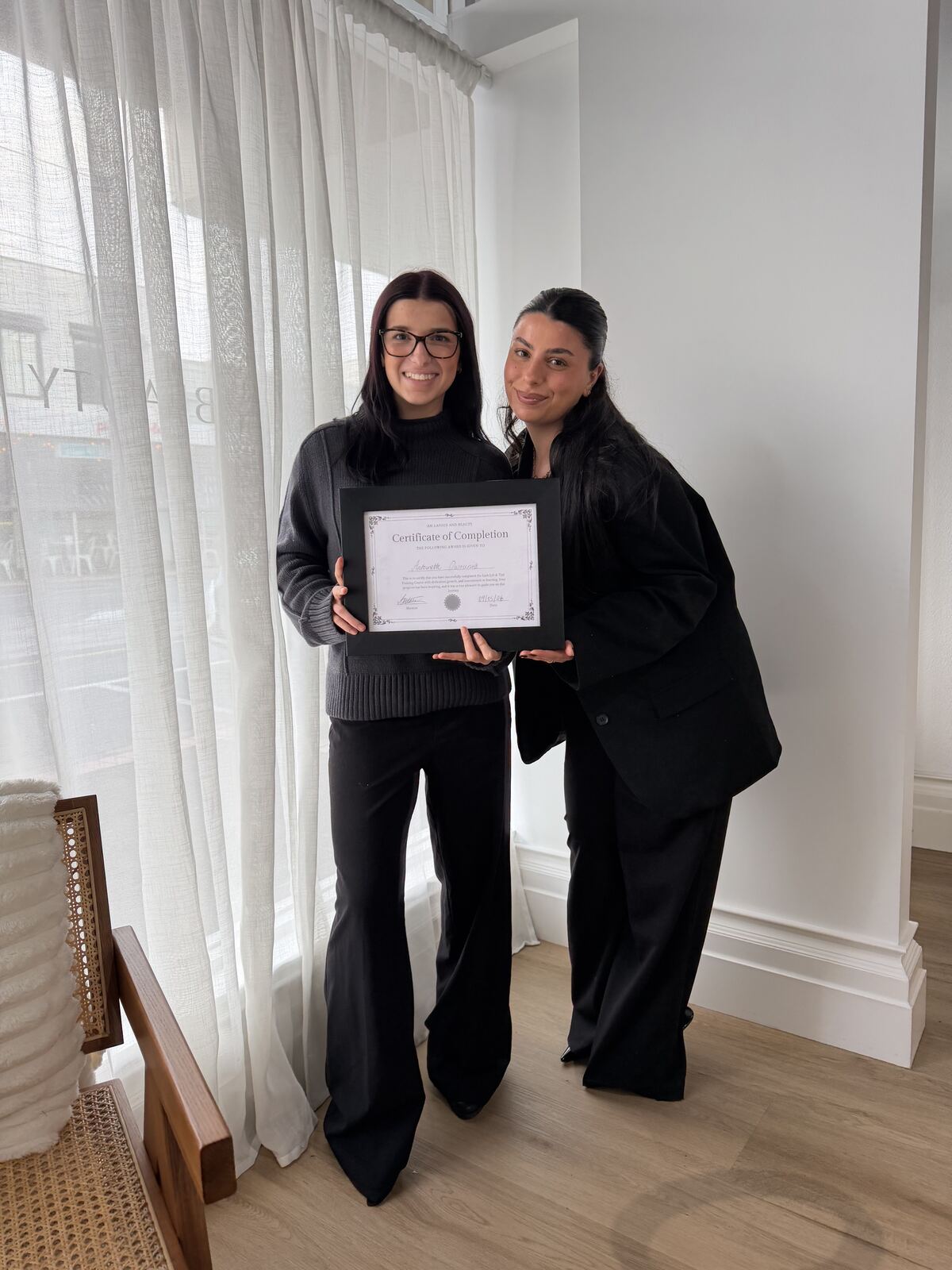 Antoinette with her training mentor at AM Lashes and Beauty